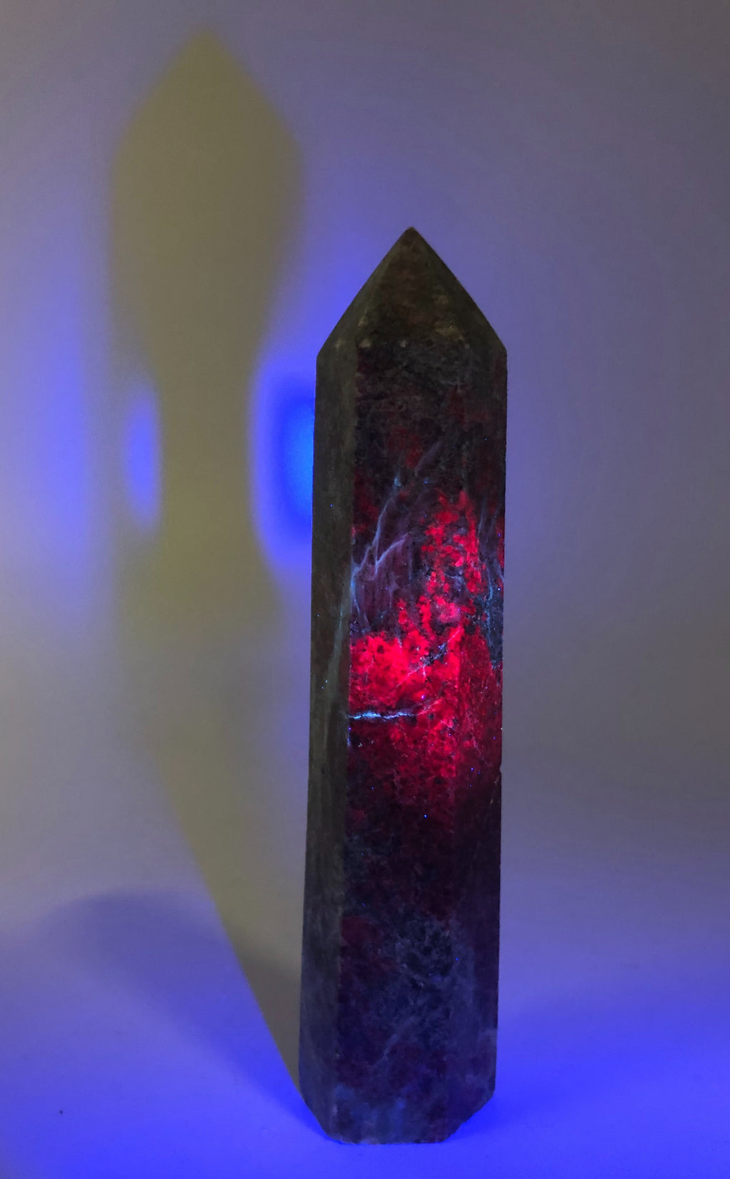 Fluorescent Rhodonite Point $22.00