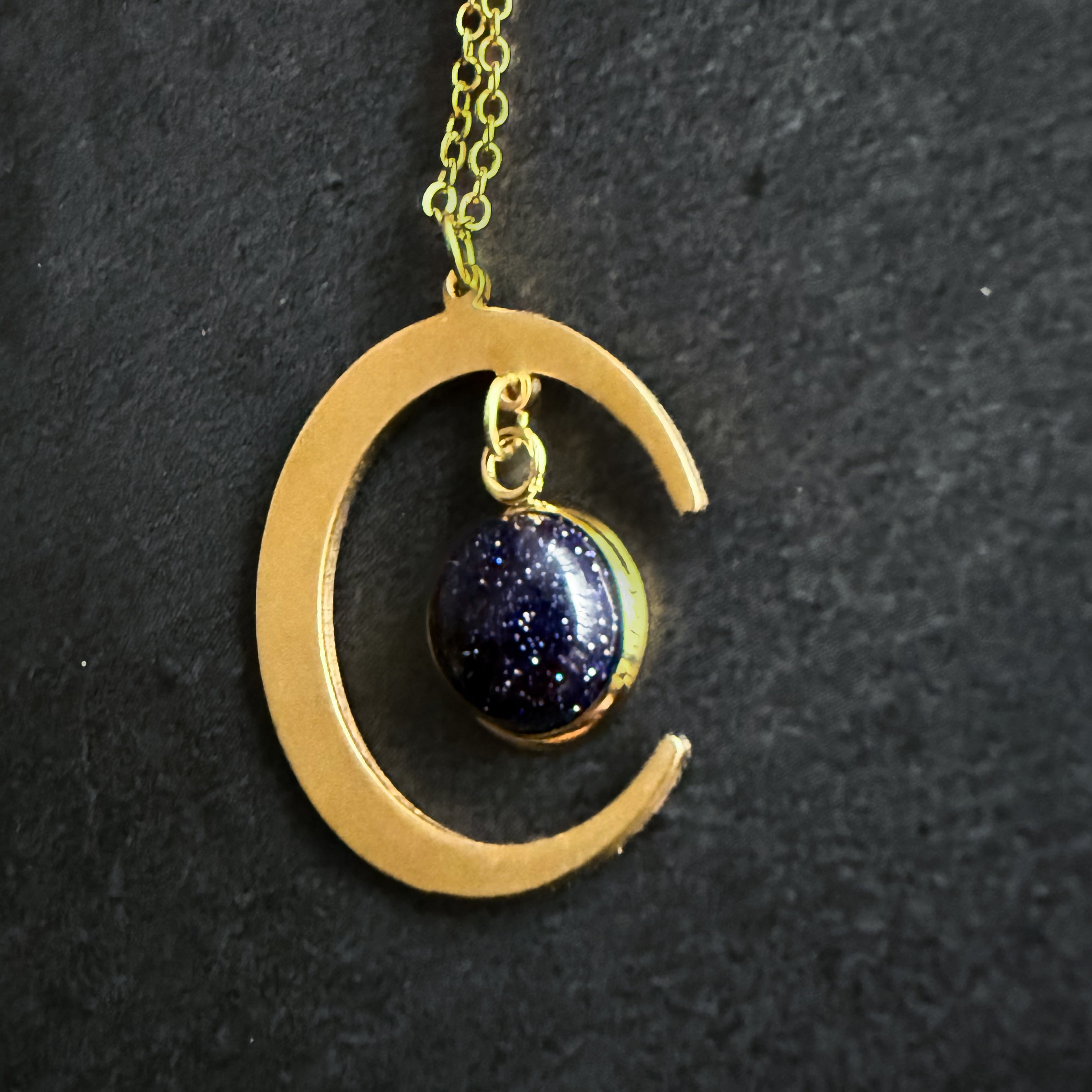 Starlit Crescent Necklace with Blue Goldstone
