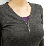 Velociraptor Necklace with Display Stand