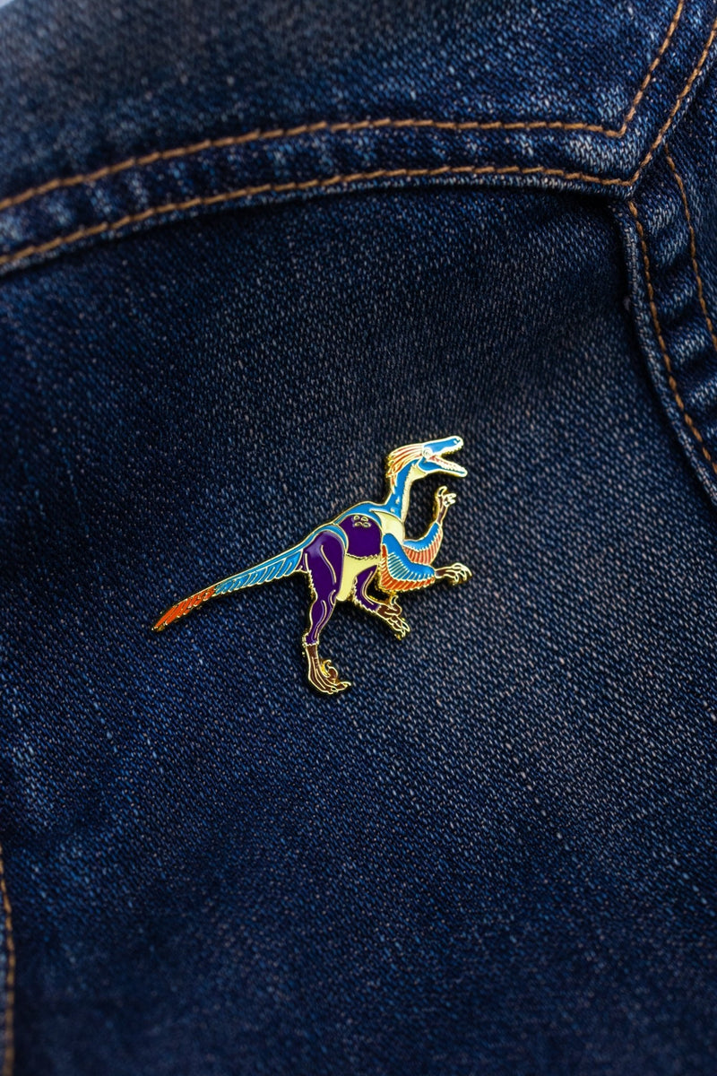 Velociraptor Enamel Pin – The Science Museum of Minnesota